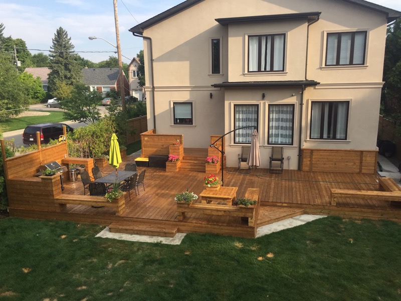 Multi-level cedar deck with built-in benches in the GTA